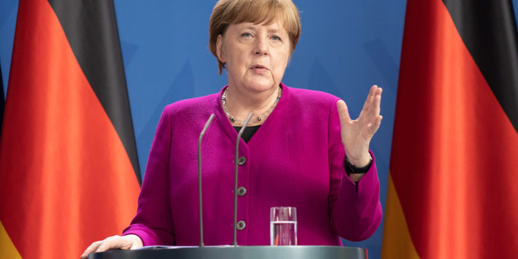 BERLIN, GERMANY - MAY 18: German Chancellor Angela Merkel speaks to the media at the Chancellery at a joint press conference with French President Emmanuel Macron (unseen), during the coronavirus crisis on May 18, 2020 in Berlin, Germany. The two leaders announced they intend to launch a joint European Union recovery initiative to the tune of EUR 500 billion. (Photo by Andreas Gora - Pool/Getty Images)