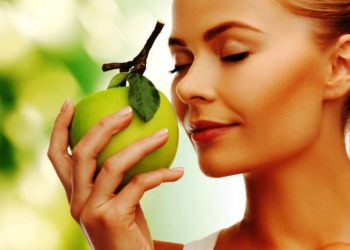 http://www.dreamstime.com/royalty-free-stock-images-woman-smelling-apple-image38289999