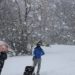 Disc golfers make their way through the snow that dropped at least five inches of snow at their tournament in Cameron Park, Sunday, Jan. 10, 2021, in Waco, Texas. (Rod Aydelotte/Waco Tribune-Herald via AP)