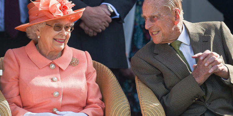 EGHAM, ENGLAND - JUNE 24: Queen Elizabeth II and Prince Philip, Duke of Edinburgh attend The OUT-SOURCING Inc Royal Windsor Cup 2018 polo match at Guards Polo Club on June 24, 2018 in Egham, England. (Photo by Antony Jones/Getty Images)