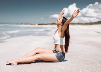 freedom woman at the beach