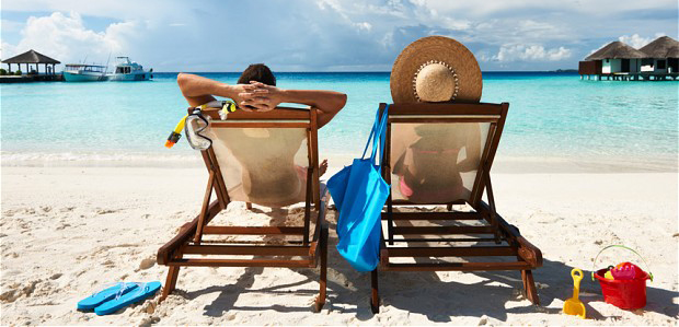 Couple on a tropical beach at Maldives