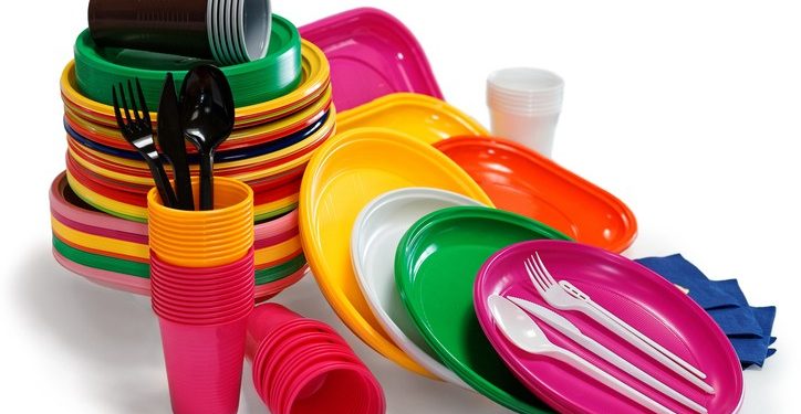 Bright Plastic tableware isolated on the white background