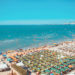 Sunny day and panoramic view to Durres beach. Blue sky and water of Adriatic Sea.