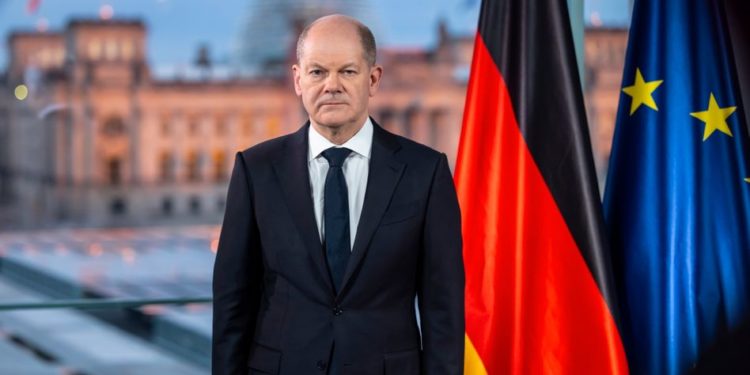 epa09781314 German Chancellor Olaf Scholz poses for pictures after he recorded a televised address to the nation following the Russian military invasion of Ukraine in Berlin, Germany, 24 February 2022. Russia began a large-scale attack on Ukraine, with explosions reported in multiple cities and far outside the restive eastern regions held by Russian-backed rebels.  EPA/Hannibal Hanschke / POOL