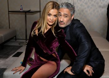 LOS ANGELES, CALIFORNIA - MARCH 13: (L-R) Rita Ora and Taika Waititi with Champagne Collet & OBC Wines as they celebrate the 27th Annual Critics Choice Awards at Fairmont Century Plaza on March 13, 2022 in Los Angeles, California. (Photo by Michael Kovac/Getty Images for Champagne Collet & OBC Wines)