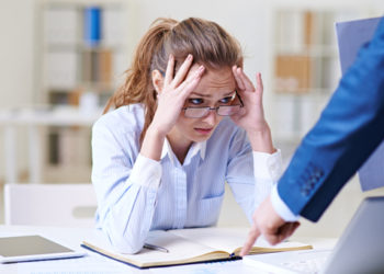 Poor office worker terrified by bossy chief